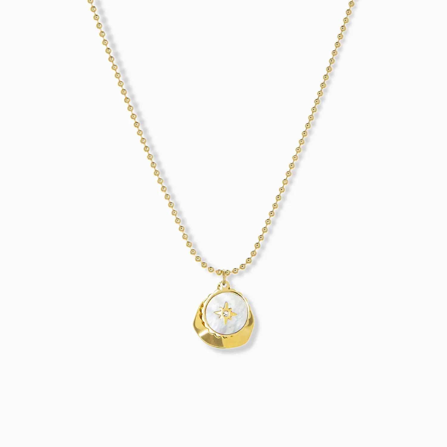 delicate chain with pearl coin compass and hammered gold charm