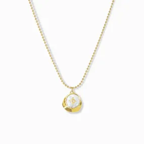 delicate chain with pearl coin compass and hammered gold charm