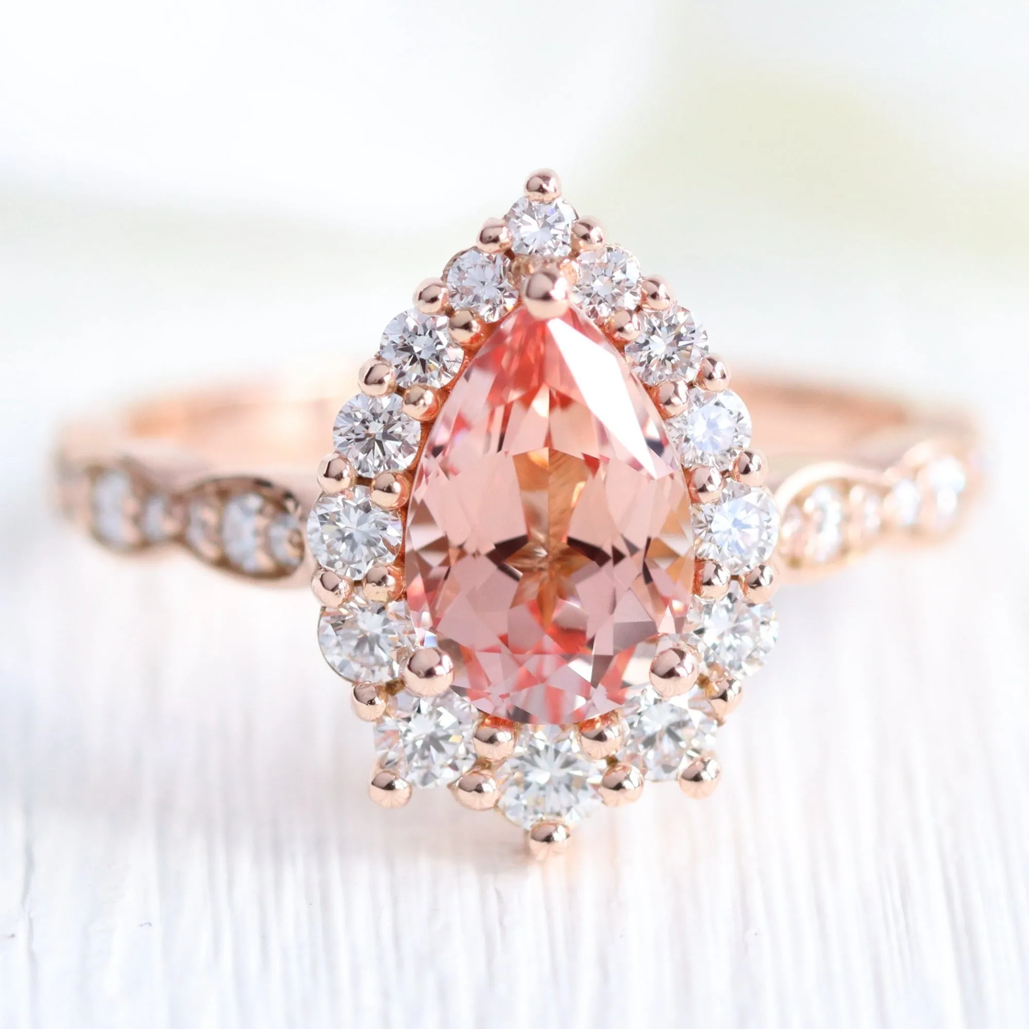 Large Pear Peach Sapphire Ring in Tiara Halo Diamond Scalloped Band