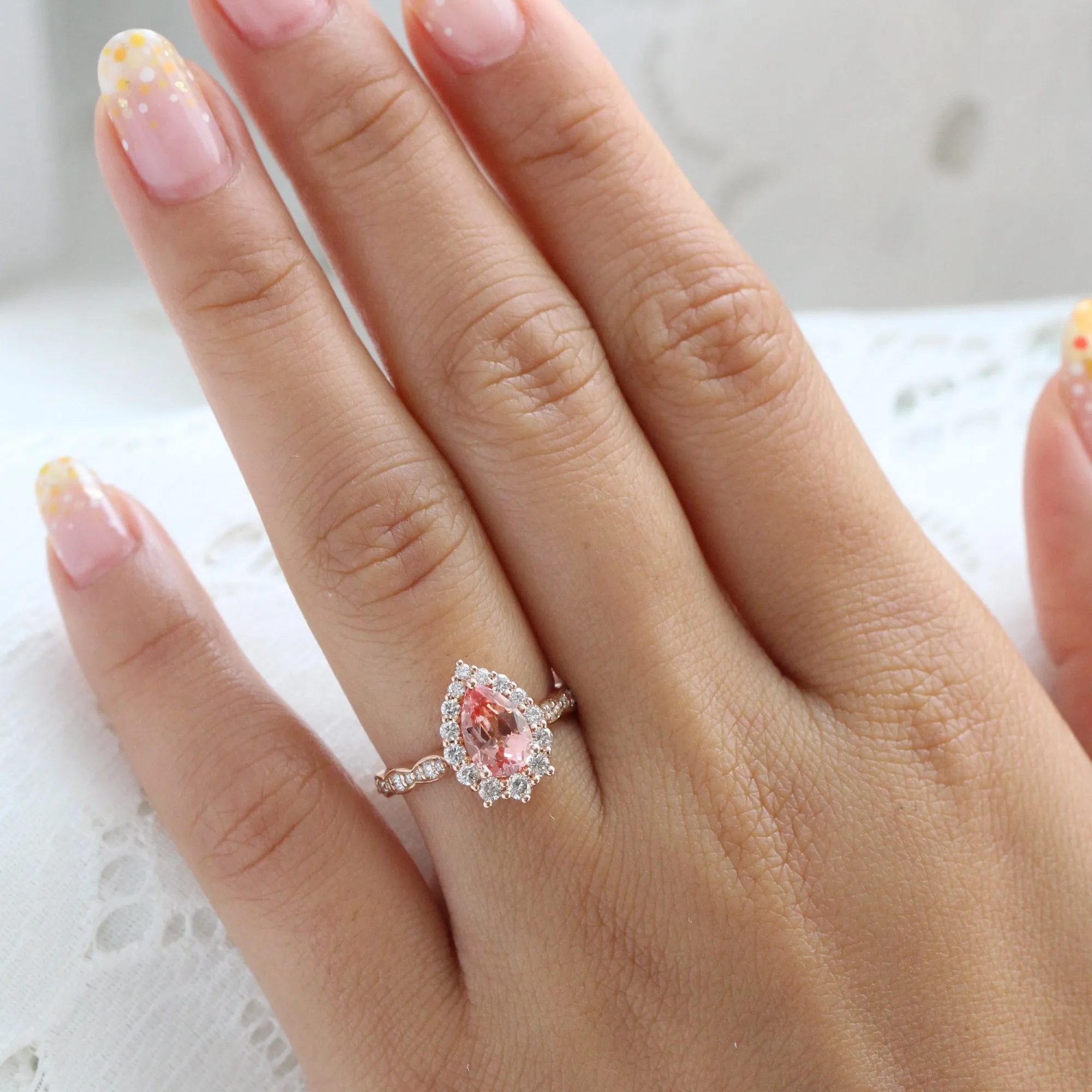 Large Pear Peach Sapphire Ring in Tiara Halo Diamond Scalloped Band