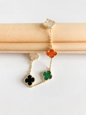 Onyx, Carnelian, Malachite and Mother of Pearl Quatrefoil Bracelet in Gold