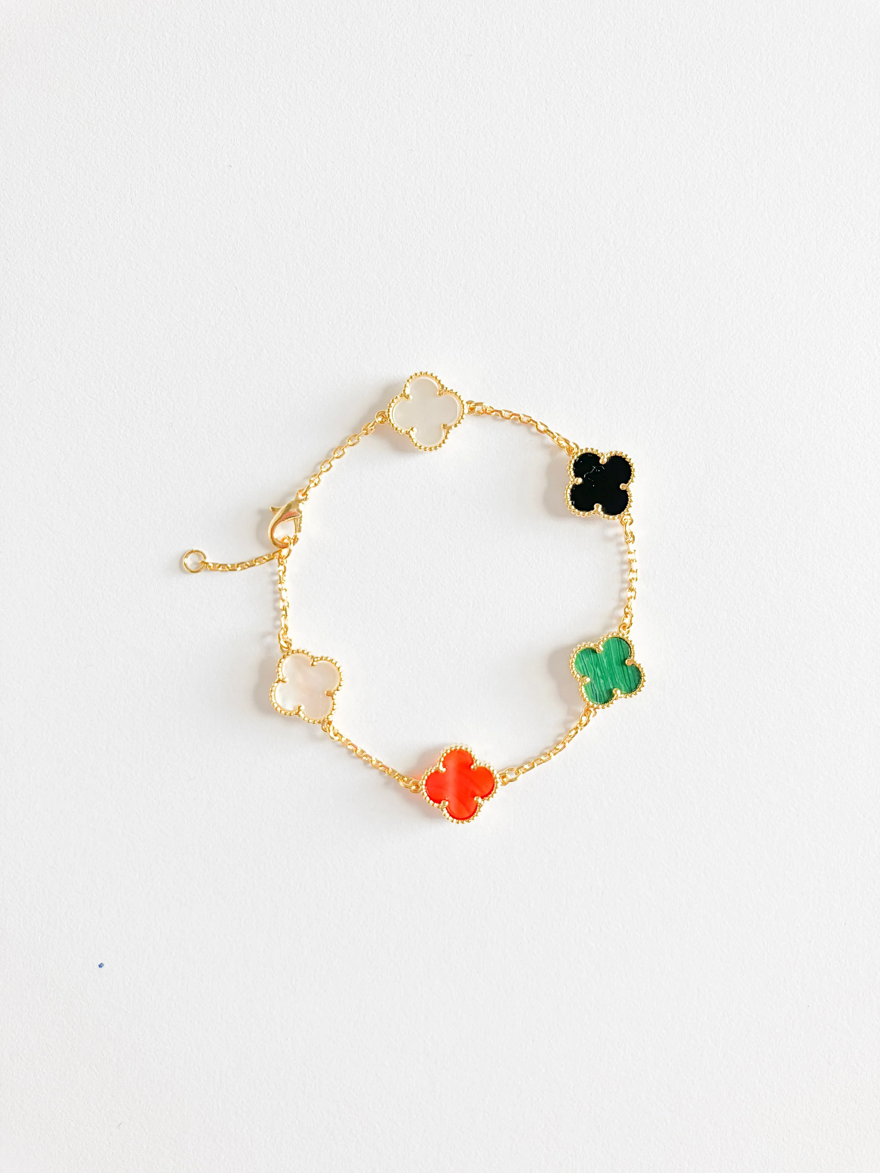 Onyx, Carnelian, Malachite and Mother of Pearl Quatrefoil Bracelet in Gold