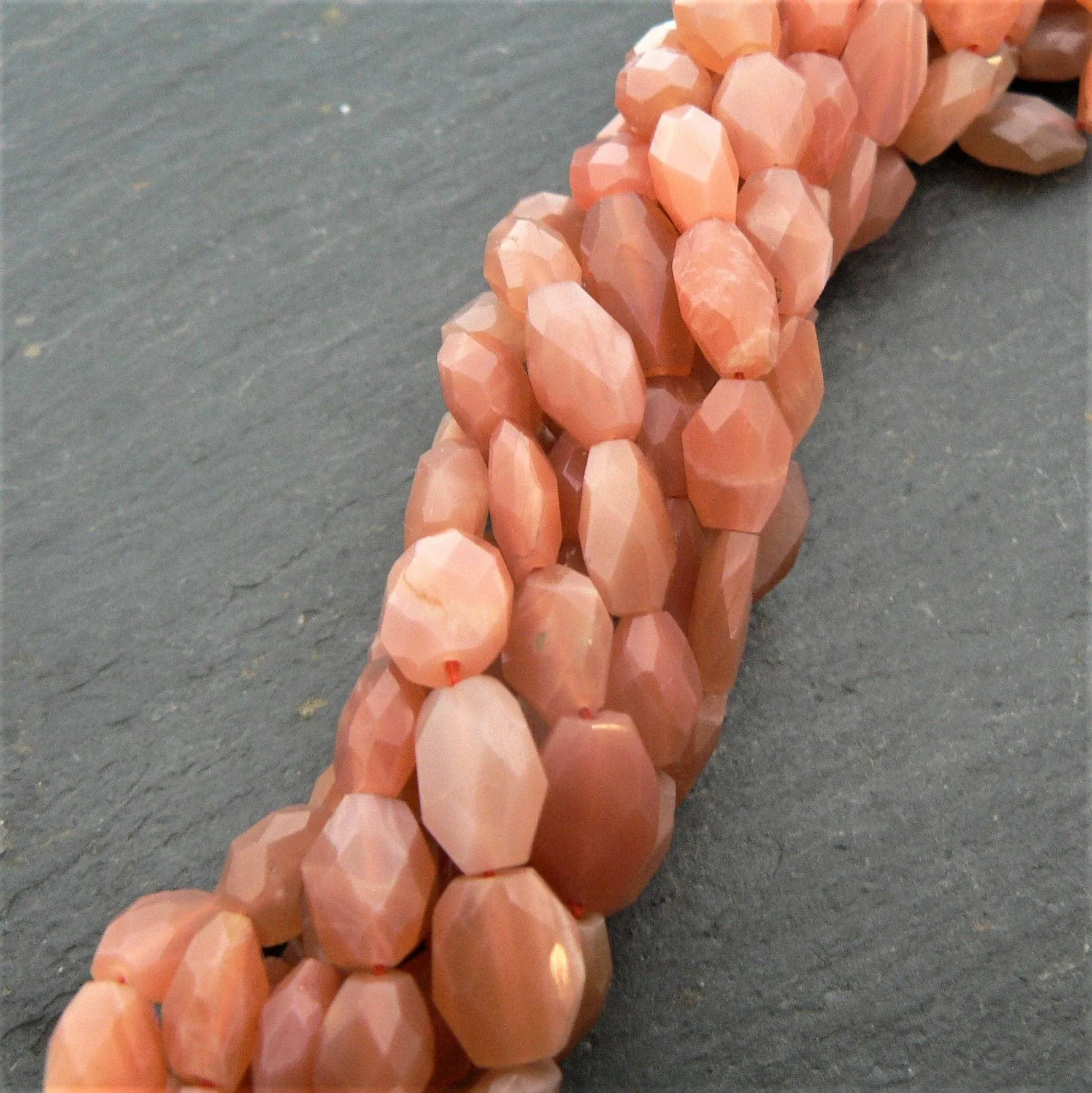 Peach Moonstone Faceted Ovals 15" Strand