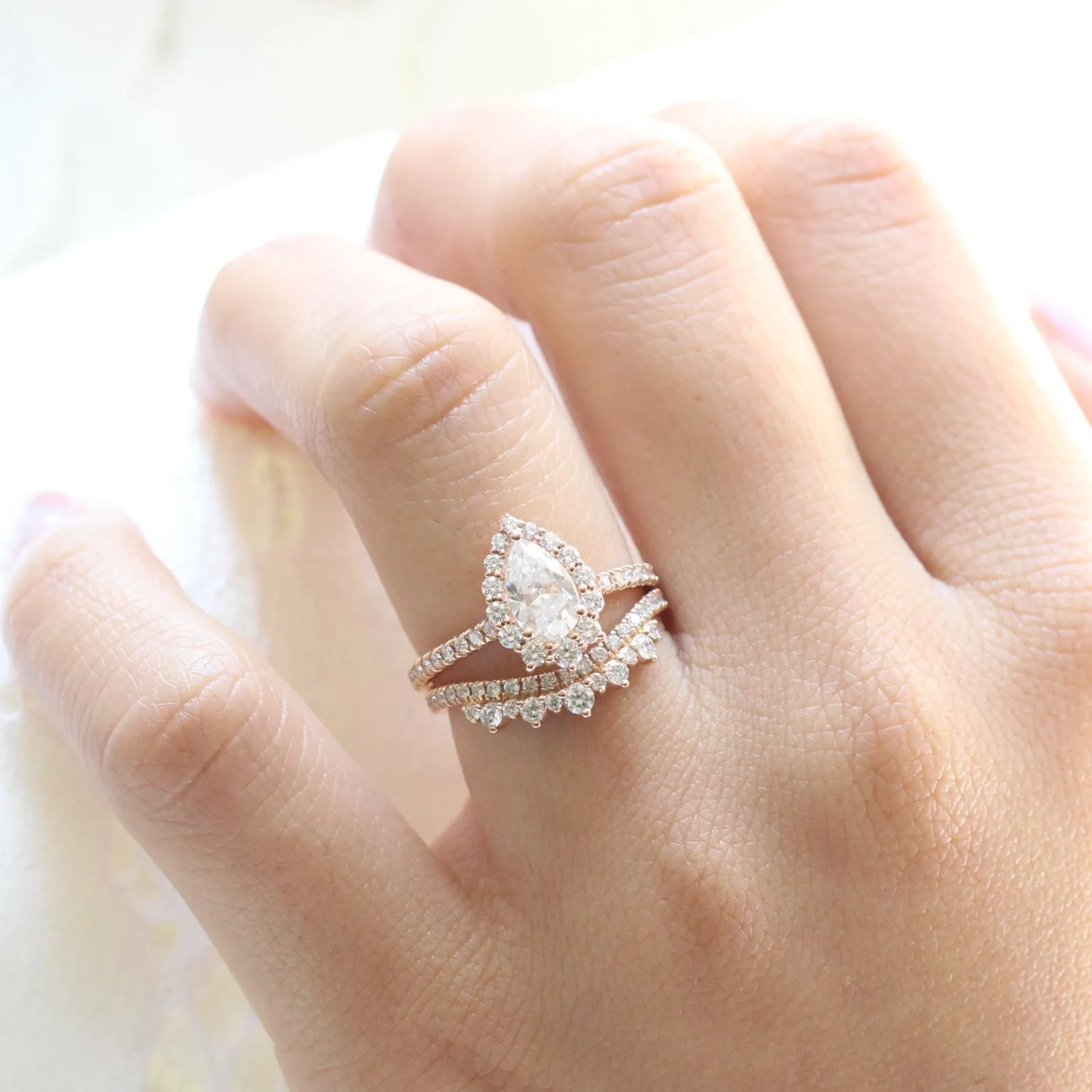 Pear Moissanite Engagement Ring in Tiara Halo Diamond Pave Band