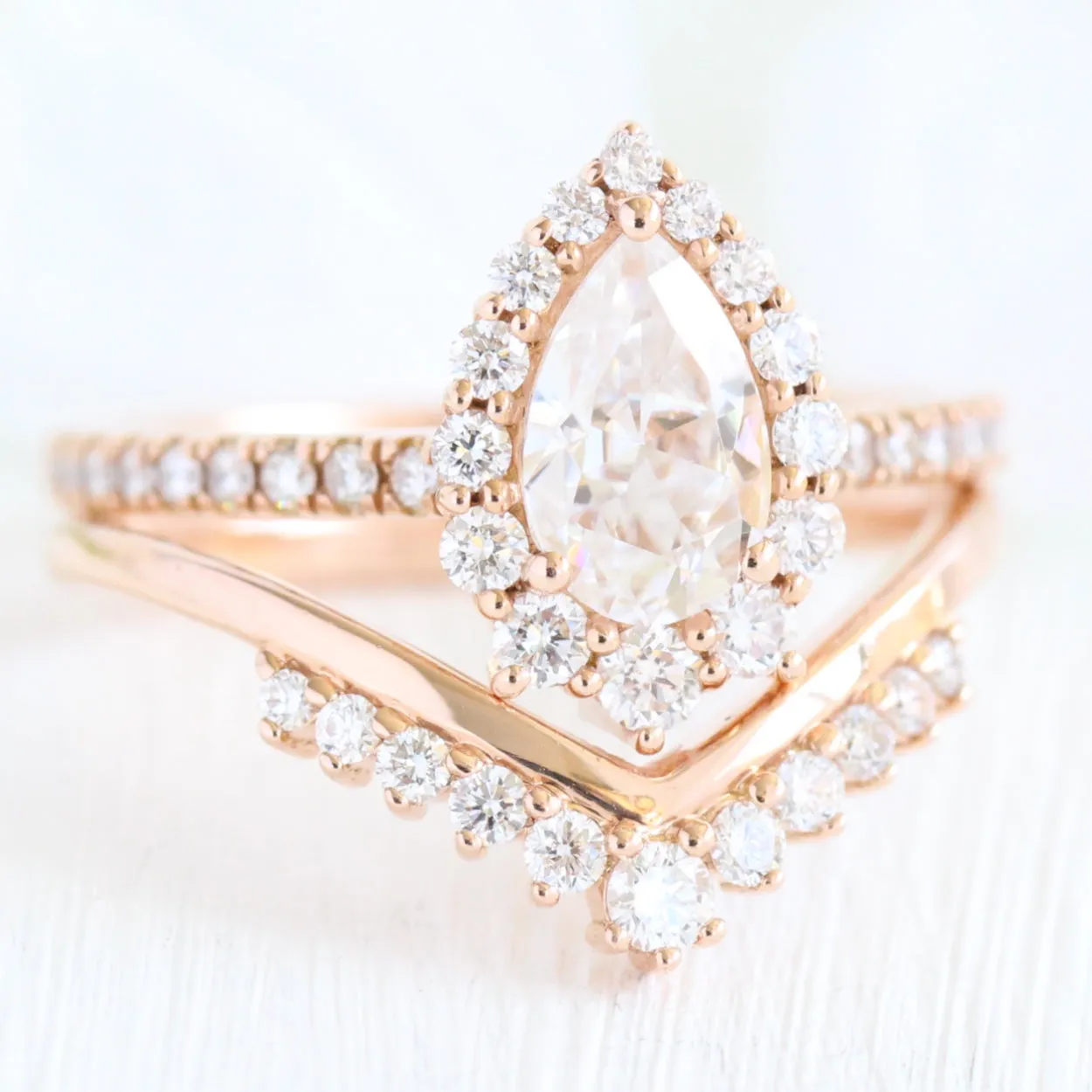 Pear Moissanite Engagement Ring in Tiara Halo Diamond Pave Band