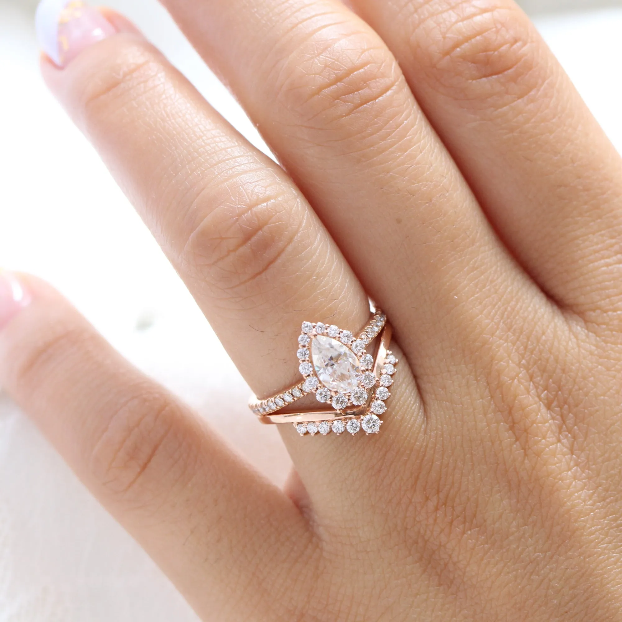 Pear Moissanite Engagement Ring in Tiara Halo Diamond Pave Band