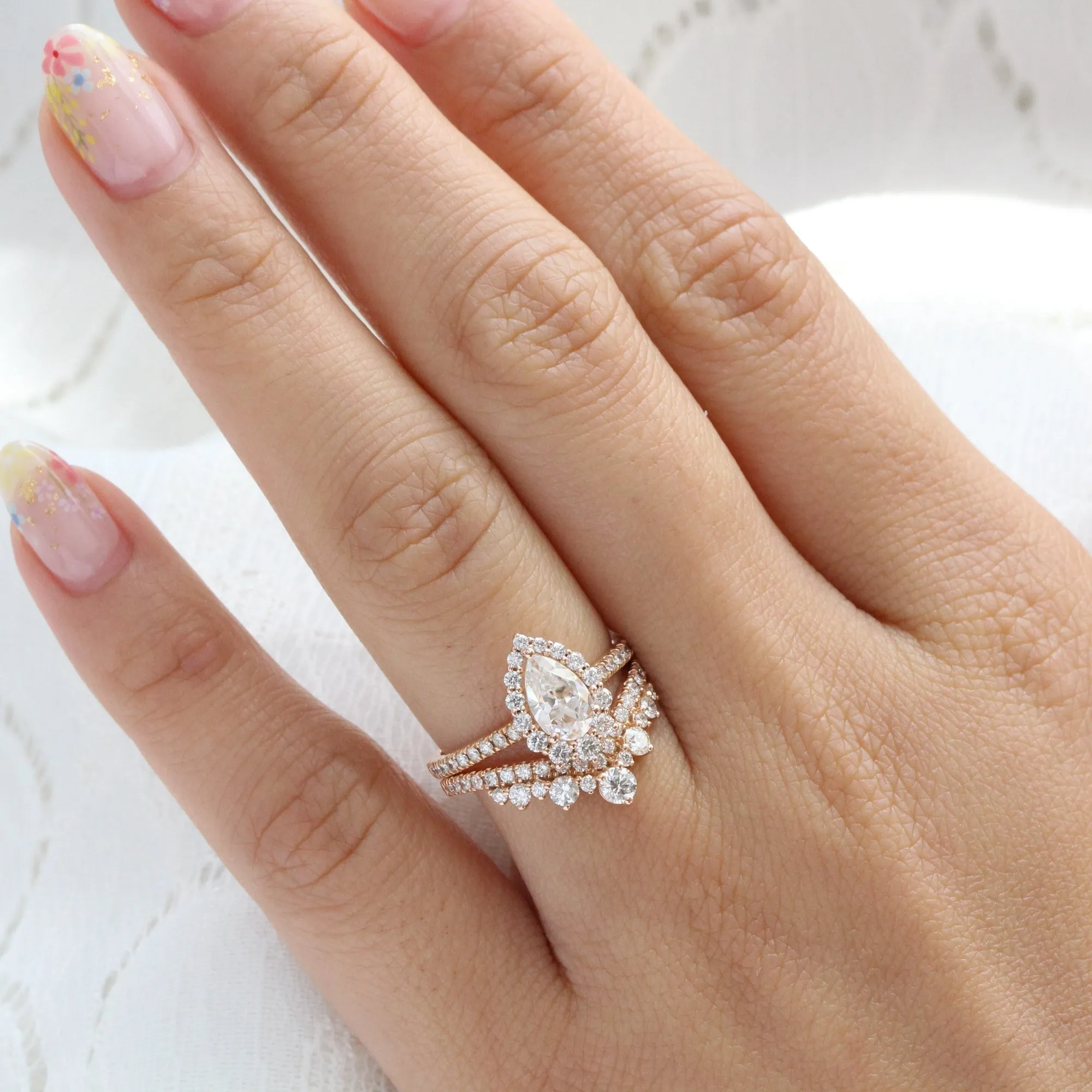 Pear Moissanite Engagement Ring in Tiara Halo Diamond Pave Band