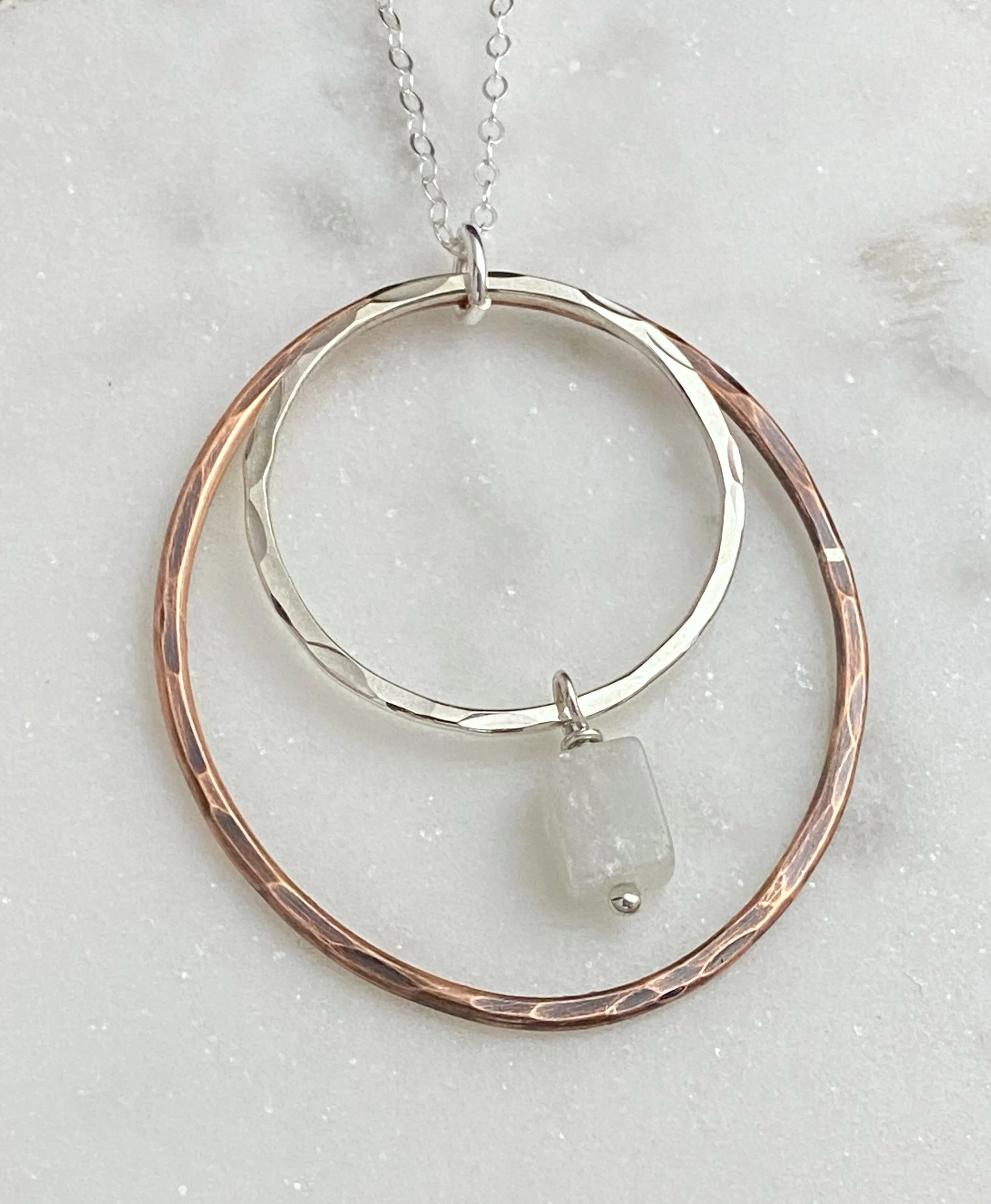 Sterling silver and copper forged hoop necklace with moonstone