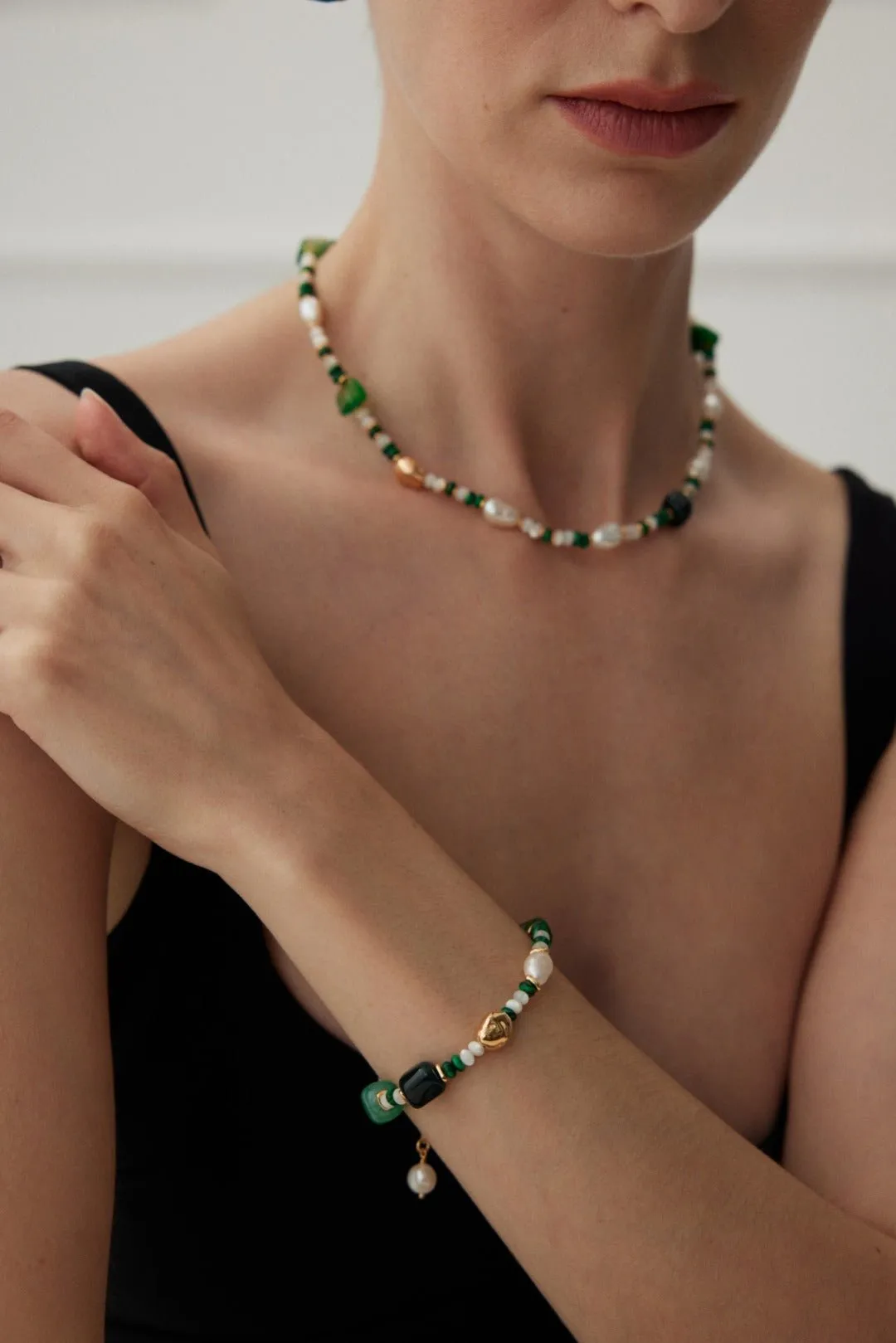 The Multielement Bracelet Featuring Malachite Pearls and Green Onyx