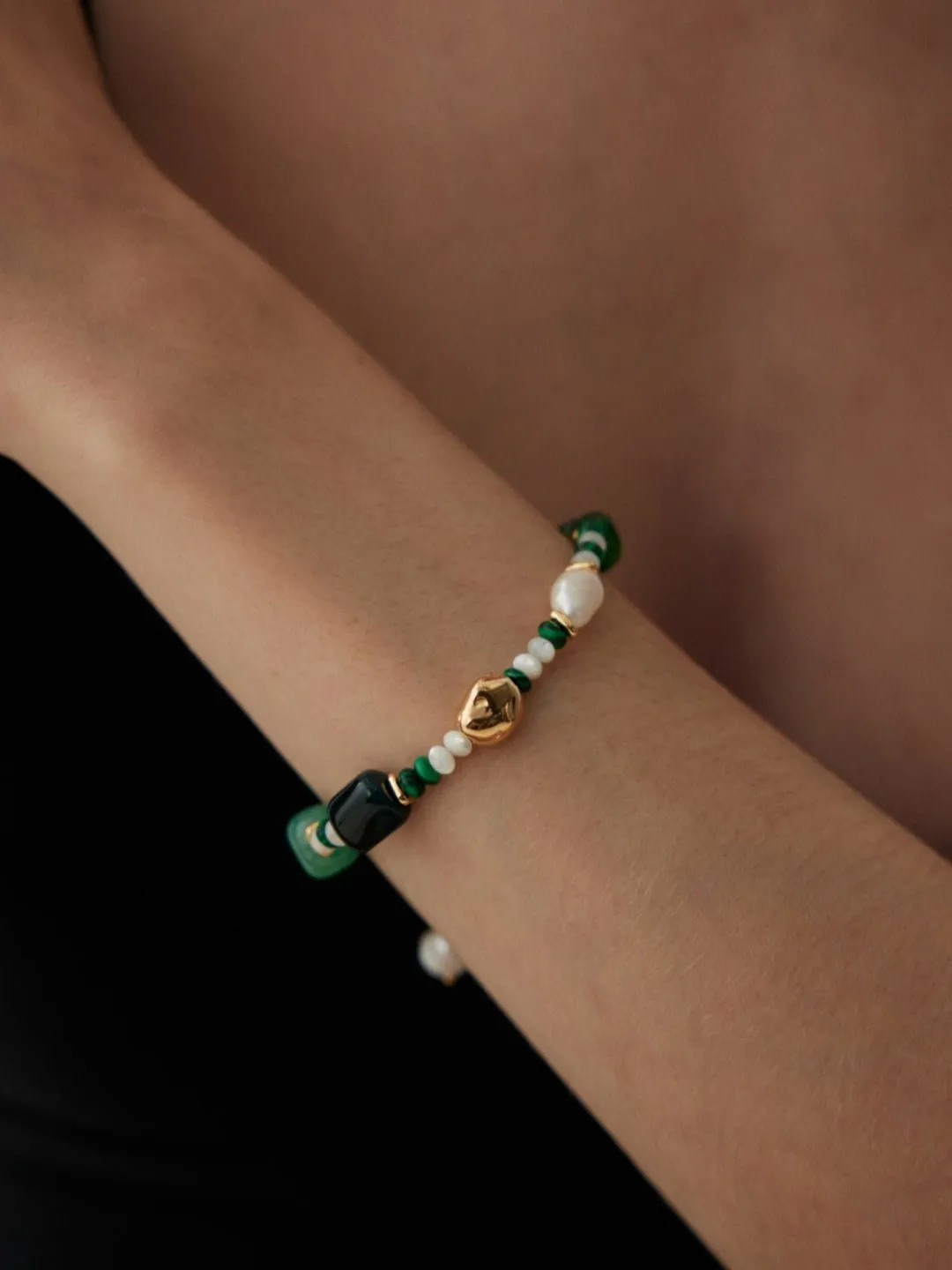 The Multielement Bracelet Featuring Malachite Pearls and Green Onyx